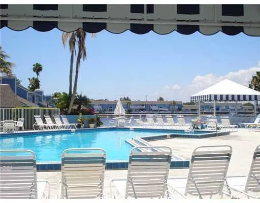 a view of a chairs and table on the terrace