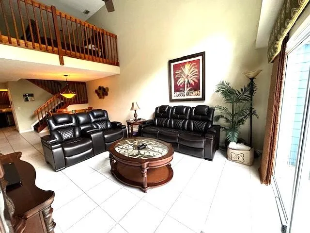 a living room with furniture and a couch