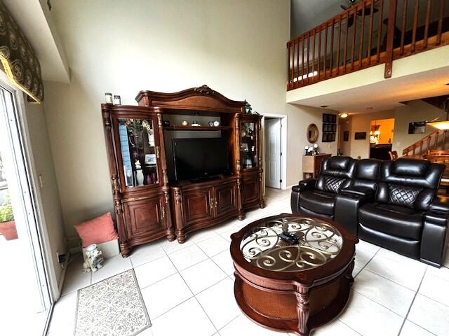 1003 Ocean Dunes Circle Jupiter, FL 33477 - Photo 8 of 33 a living room with furniture and a flat screen tv