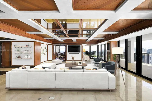 a living room with furniture large window and flat screen tv