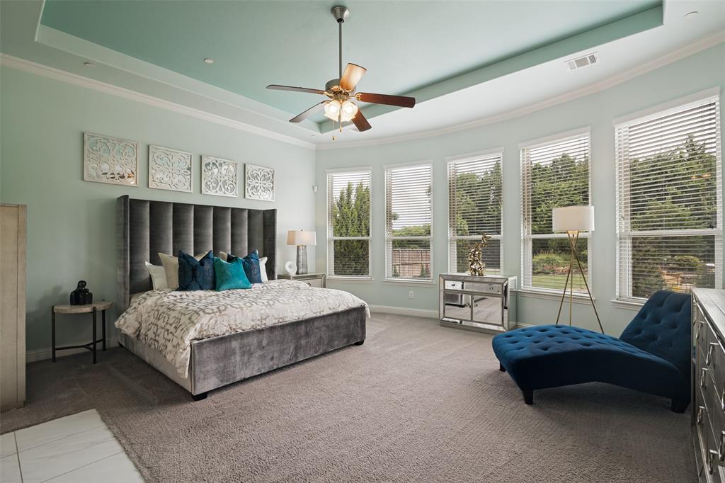 388 Bethany Road Sunnyvale, TX 75182 - Photo 16 of 40 Primary bedroom with tray ceiling with recessed lighting and a ceiling fan