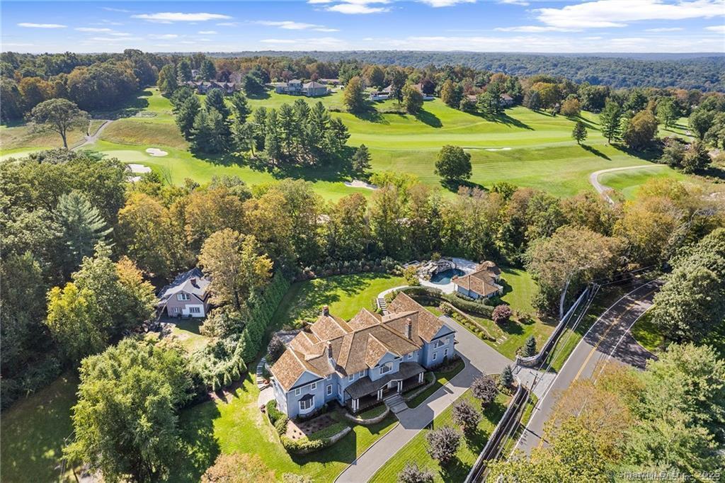 64 Old Redding Road Weston, CT 06883 - Photo 2 of 38 a view of a city with mountains in the background
