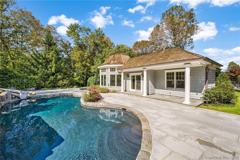 64 Old Redding Road Weston, CT 06883 - Photo 32 of 38 a front view of house with yard nad seating space