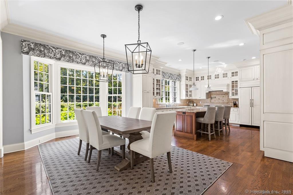 64 Old Redding Road Weston, CT 06883 - Photo 9 of 38 a view of a dining room with furniture window and wooden floor