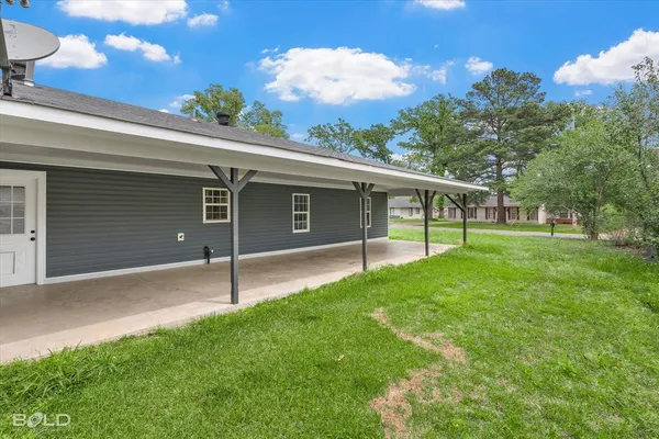 a house view with a garden space