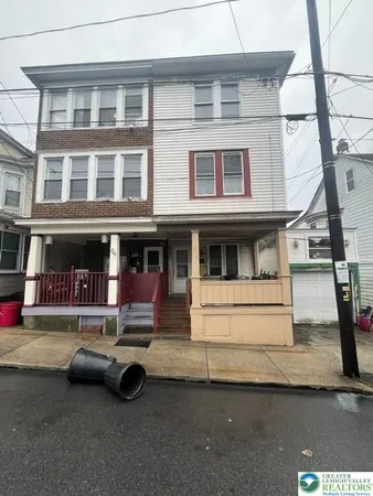 a view of a street with cars
