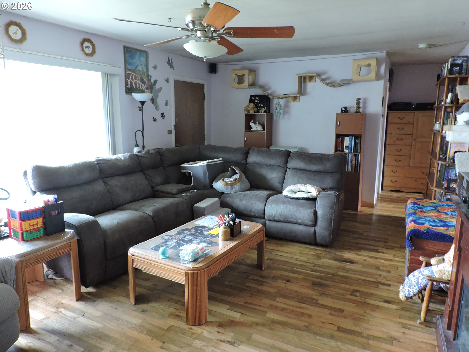 9200 Southwest Sagert Street Tualatin, OR 97062 - Photo 5 of 6 a living room with furniture and a wooden floor