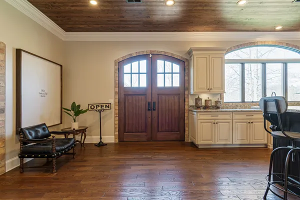 a bedroom with a bed and gym equipment