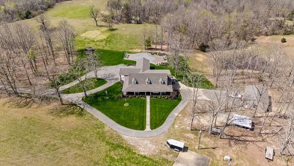 a front view of building with yard