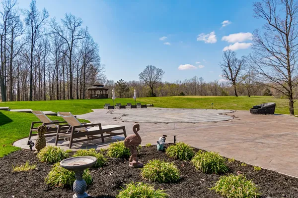 a view of a backyard of the house