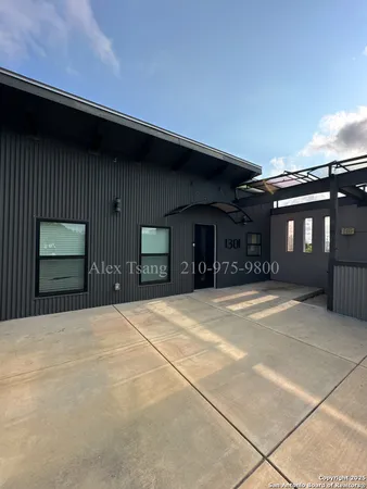 a front view of a building with garage