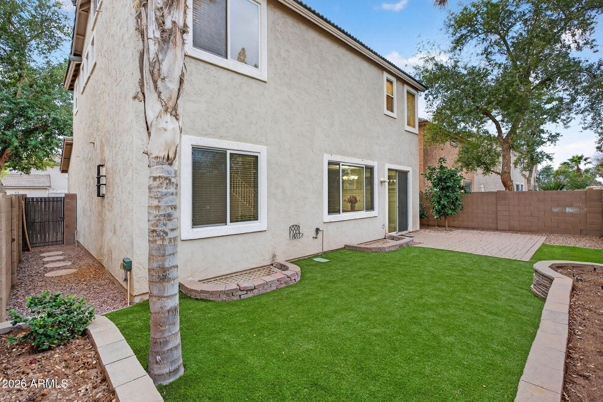 4052 East Milky Way Gilbert, AZ 85295 - Photo 7 of 73 a view of house with backyard