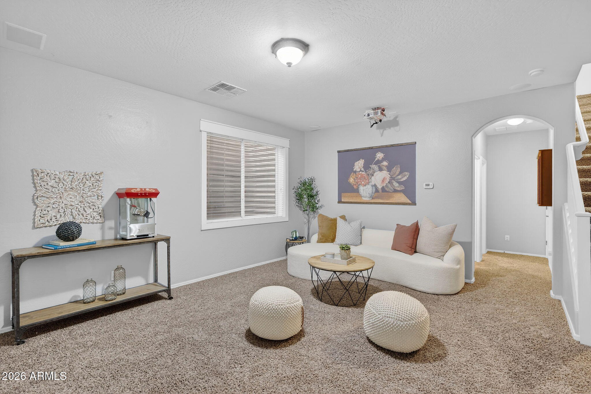 4052 East Milky Way Gilbert, AZ 85295 - Photo 22 of 73 a living room with furniture and a window