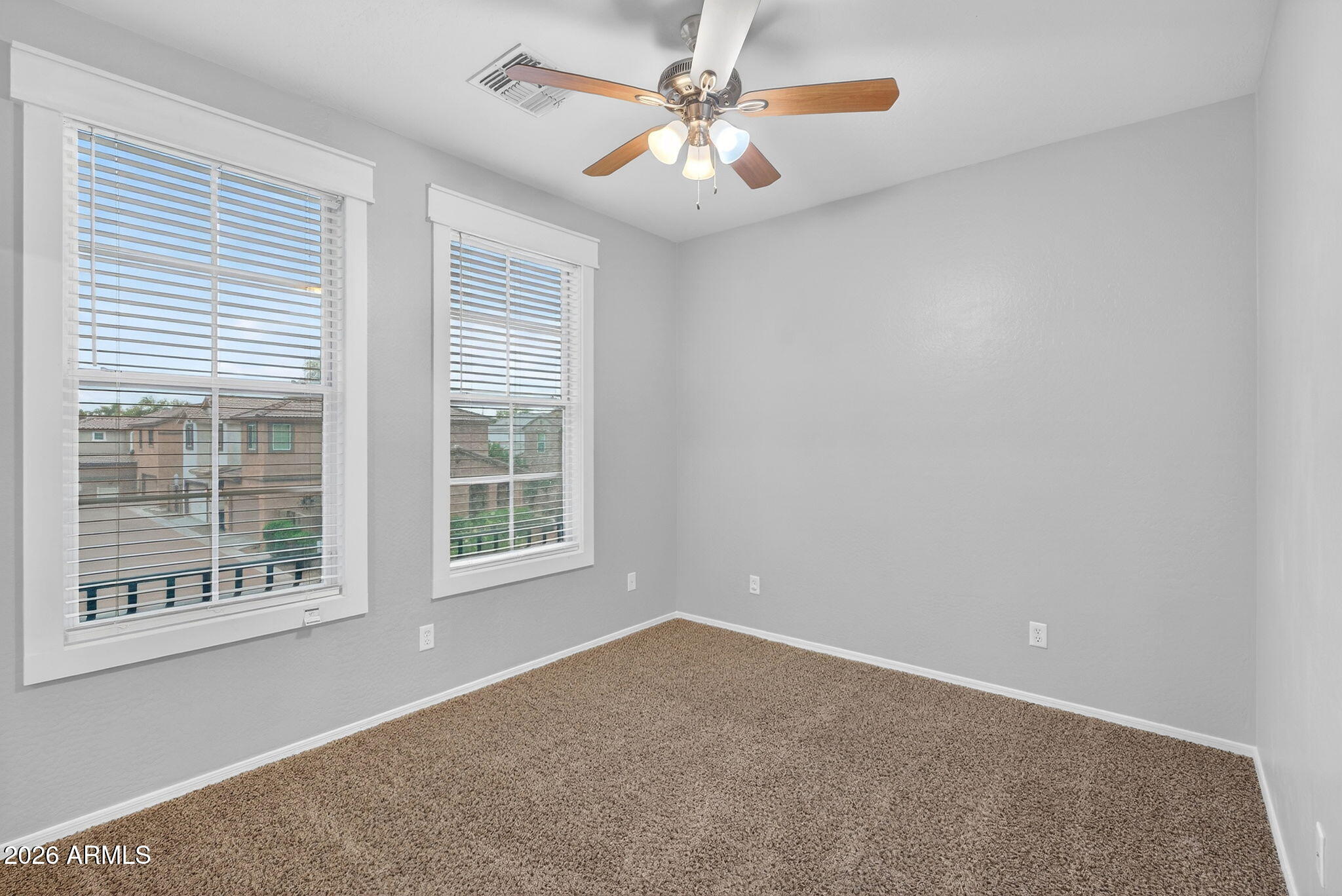 4052 East Milky Way Gilbert, AZ 85295 - Photo 32 of 73 a view of an empty room with a window