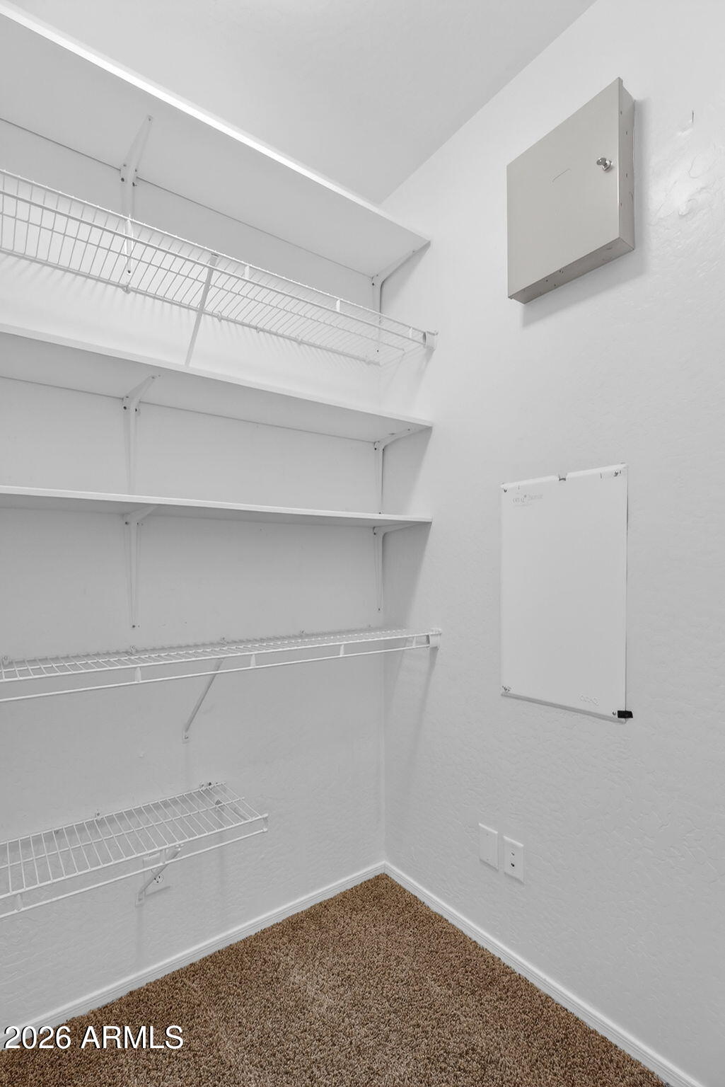 4052 East Milky Way Gilbert, AZ 85295 - Photo 40 of 73 a view of a room with racks on the wall