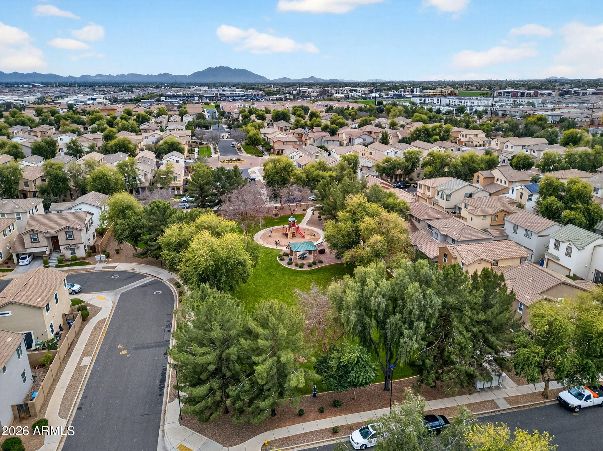 4052 East Milky Way Gilbert, AZ 85295 - Photo 64 of 73 an aerial view of a city with lots of residential buildings