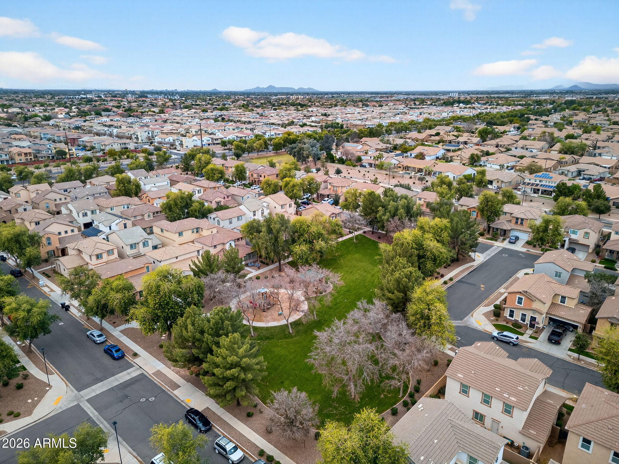 4052 East Milky Way Gilbert, AZ 85295 - Photo 66 of 73 an aerial view of residential houses with outdoor space