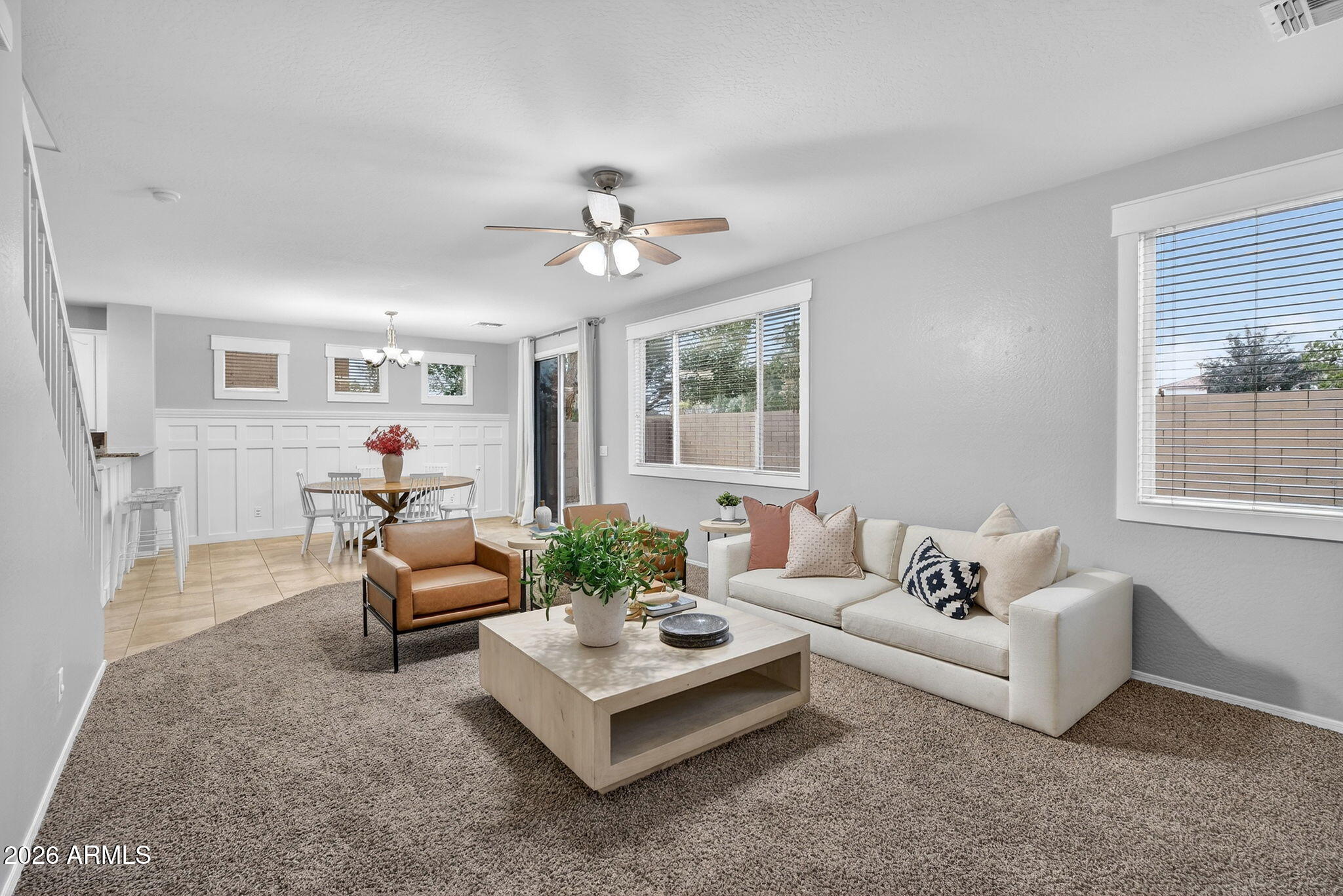 4052 East Milky Way Gilbert, AZ 85295 - Photo 4 of 73 a living room with furniture and a large window
