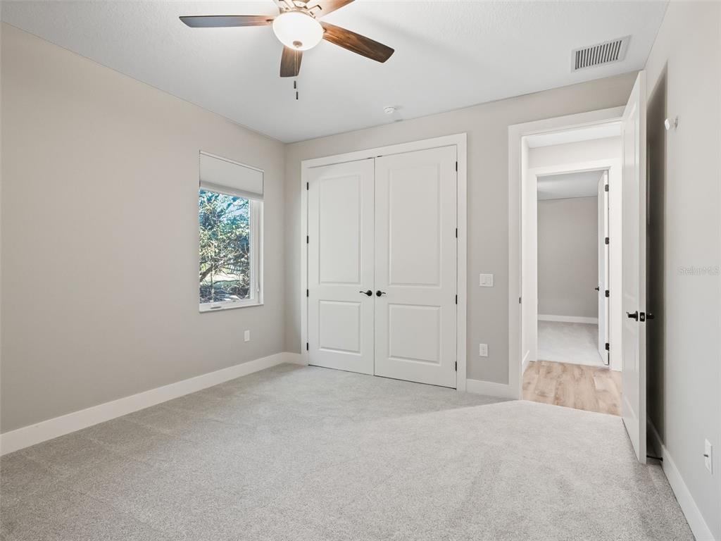 562 Dowling Circle Lady Lake, FL 32159 - Photo 36 of 62 a view of an empty room with a window