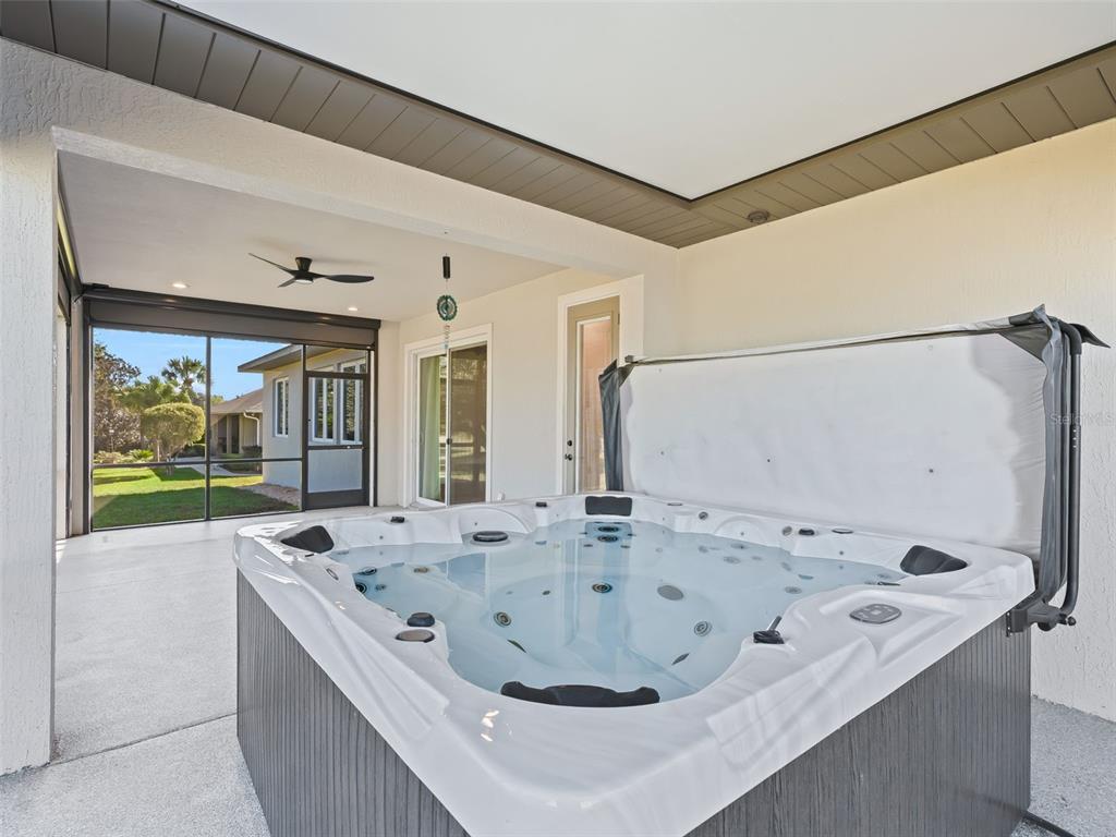 562 Dowling Circle Lady Lake, FL 32159 - Photo 49 of 62 a bath tub sitting in a bathroom next to a sink