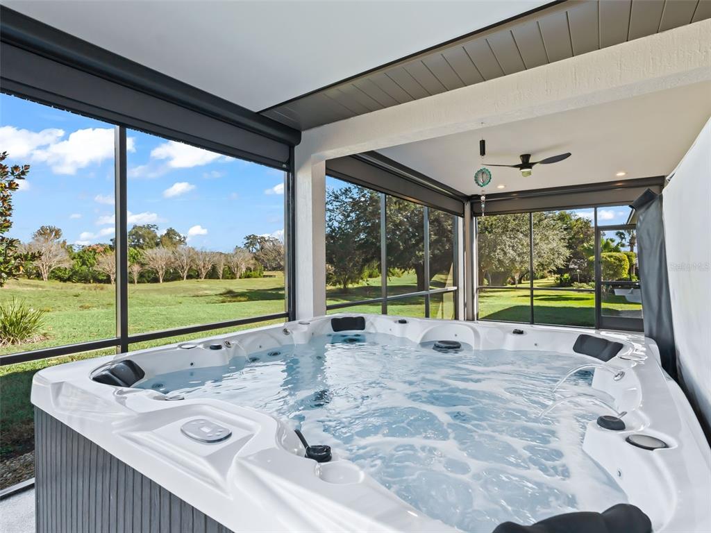 562 Dowling Circle Lady Lake, FL 32159 - Photo 50 of 62 a room with window table and chairs