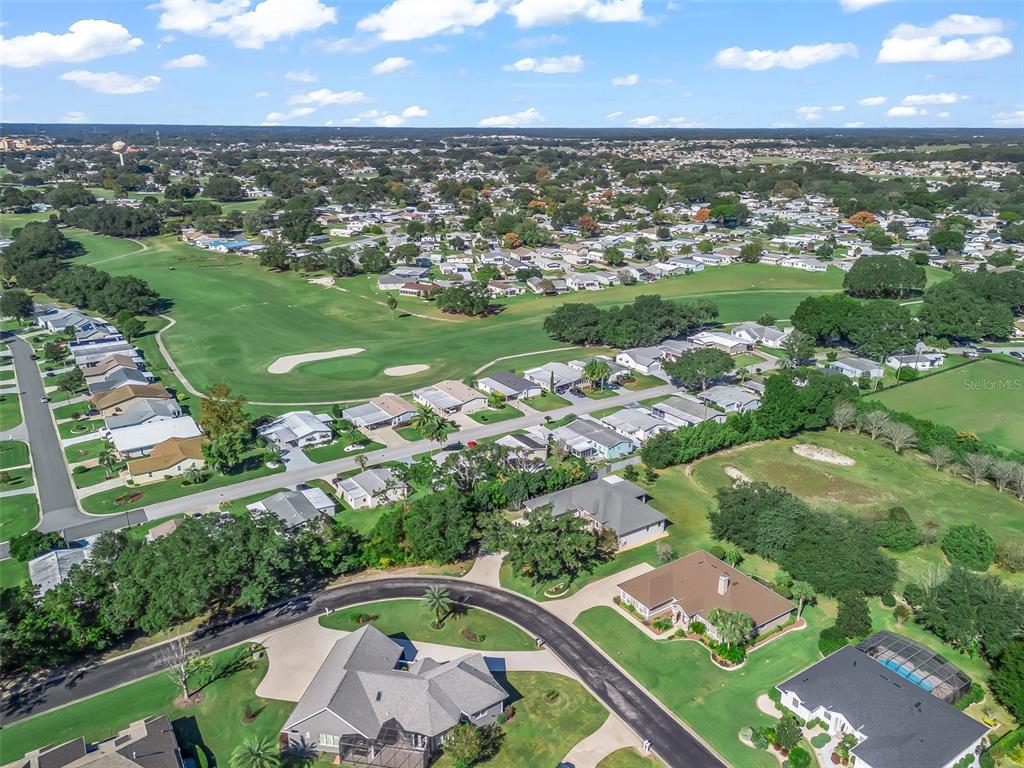 562 Dowling Circle Lady Lake, FL 32159 - Photo 60 of 62 an aerial view of a residential houses with outdoor space and street view