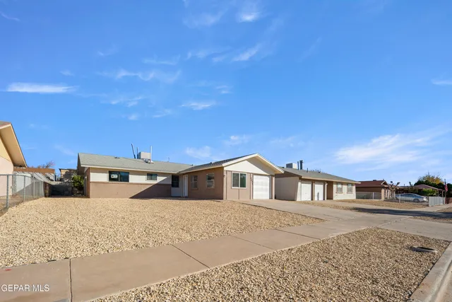 a very nice looking house with a large window