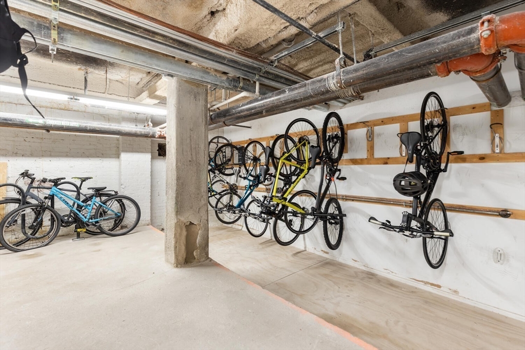 181 Essex Street, Unit E402 Boston, MA 02111 - Photo 9 of 10 a view of a bike garage