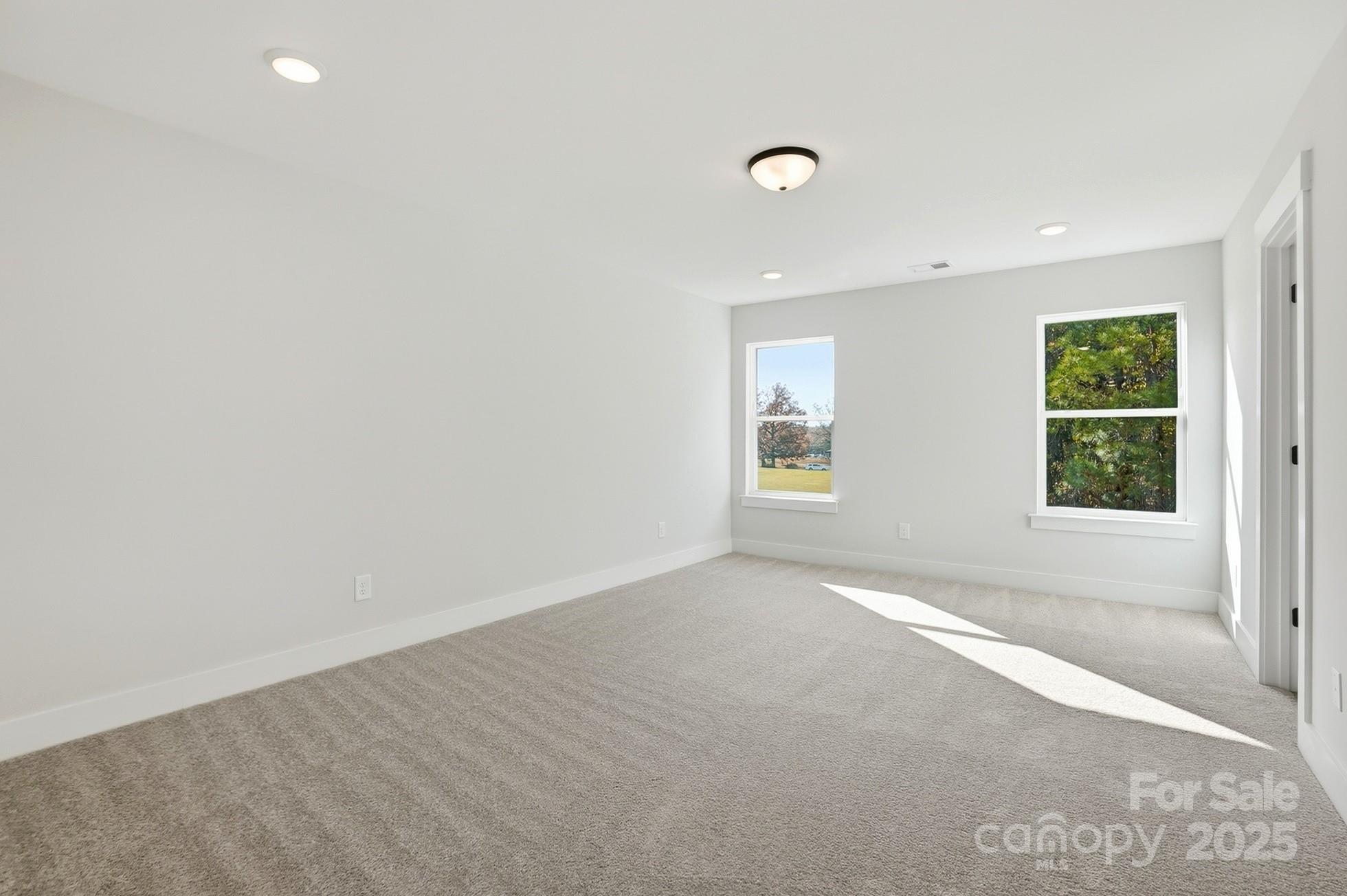 111 Viburnum Road Waxhaw, NC 28173 - Photo 21 of 39 an empty room with windows