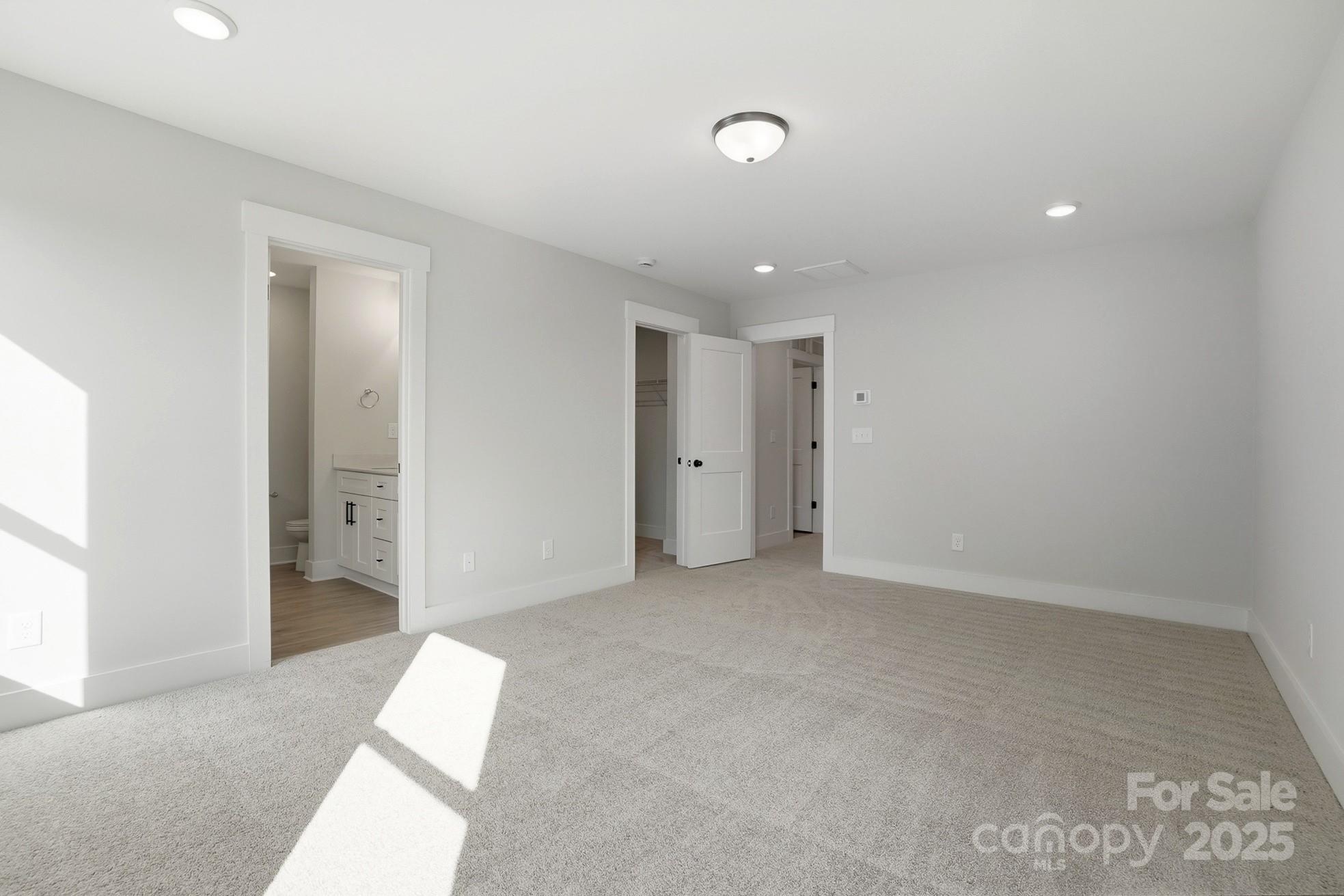 111 Viburnum Road Waxhaw, NC 28173 - Photo 23 of 39 an empty room with a natural light