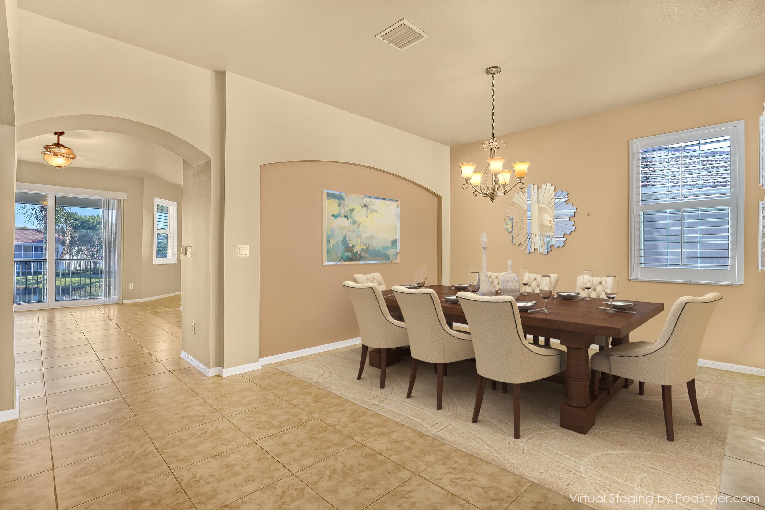 2136 Wingate Bend Wellington, FL 33414 - Photo 12 of 44 a view of a dining room with furniture window and outside view