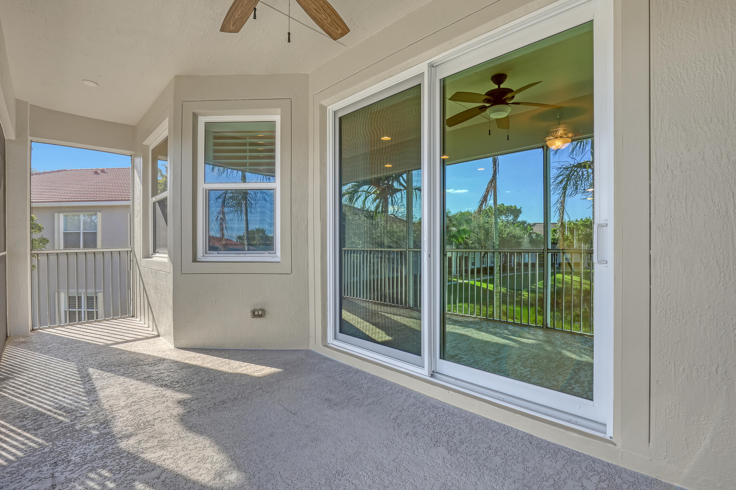 2136 Wingate Bend Wellington, FL 33414 - Photo 31 of 44 a view of a door with a tree
