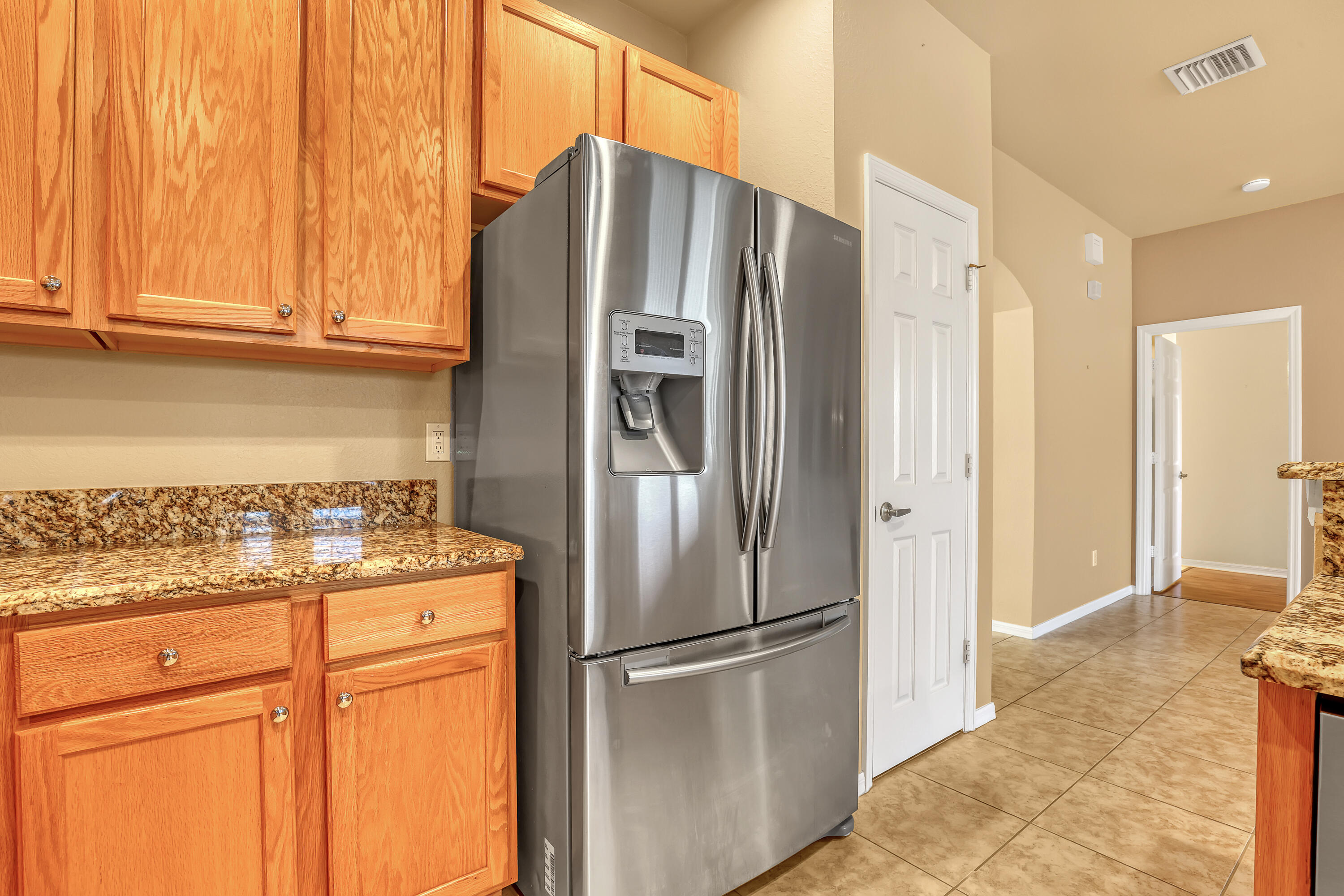 2136 Wingate Bend Wellington, FL 33414 - Photo 4 of 44 a kitchen with stainless steel appliances granite countertop a refrigerator and a stove