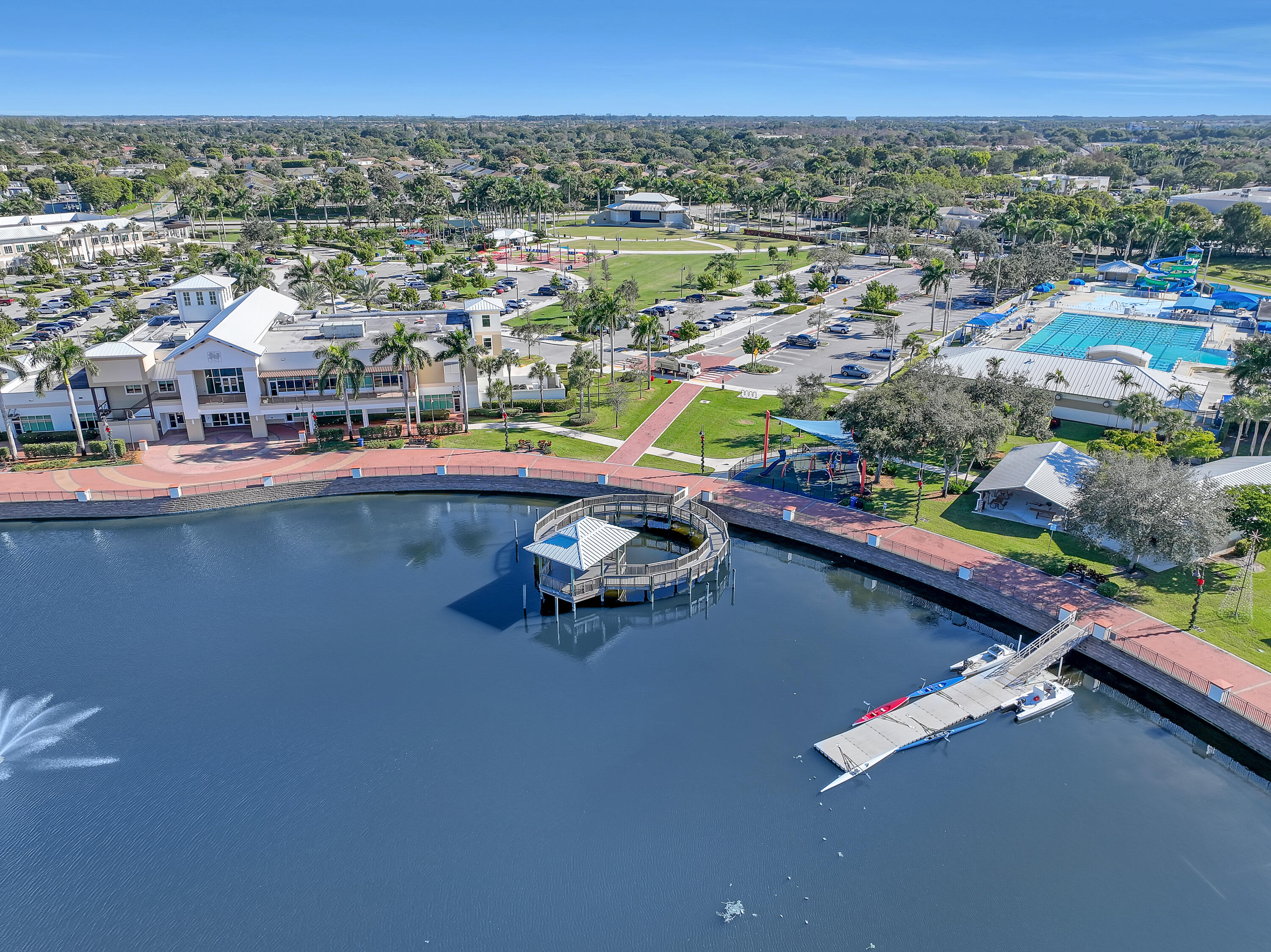 2136 Wingate Bend Wellington, FL 33414 - Photo 42 of 44 an aerial view of residential houses with outdoor space and swimming pool