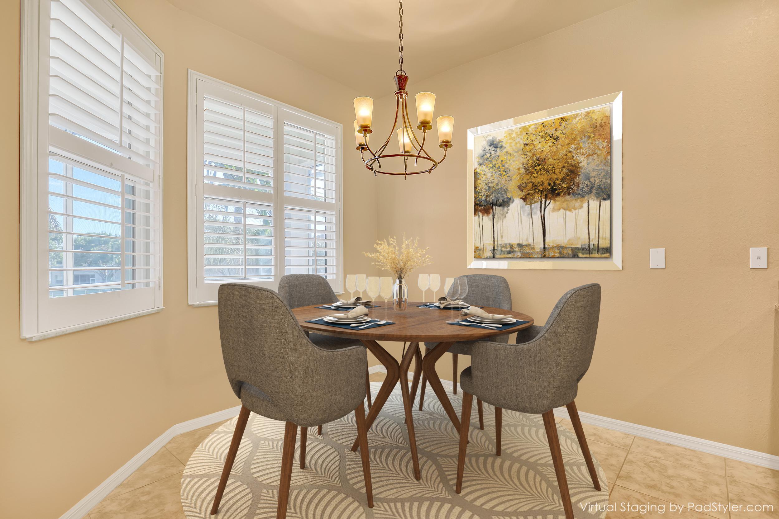 2136 Wingate Bend Wellington, FL 33414 - Photo 7 of 44 a dining room with furniture a chandelier and wooden floor