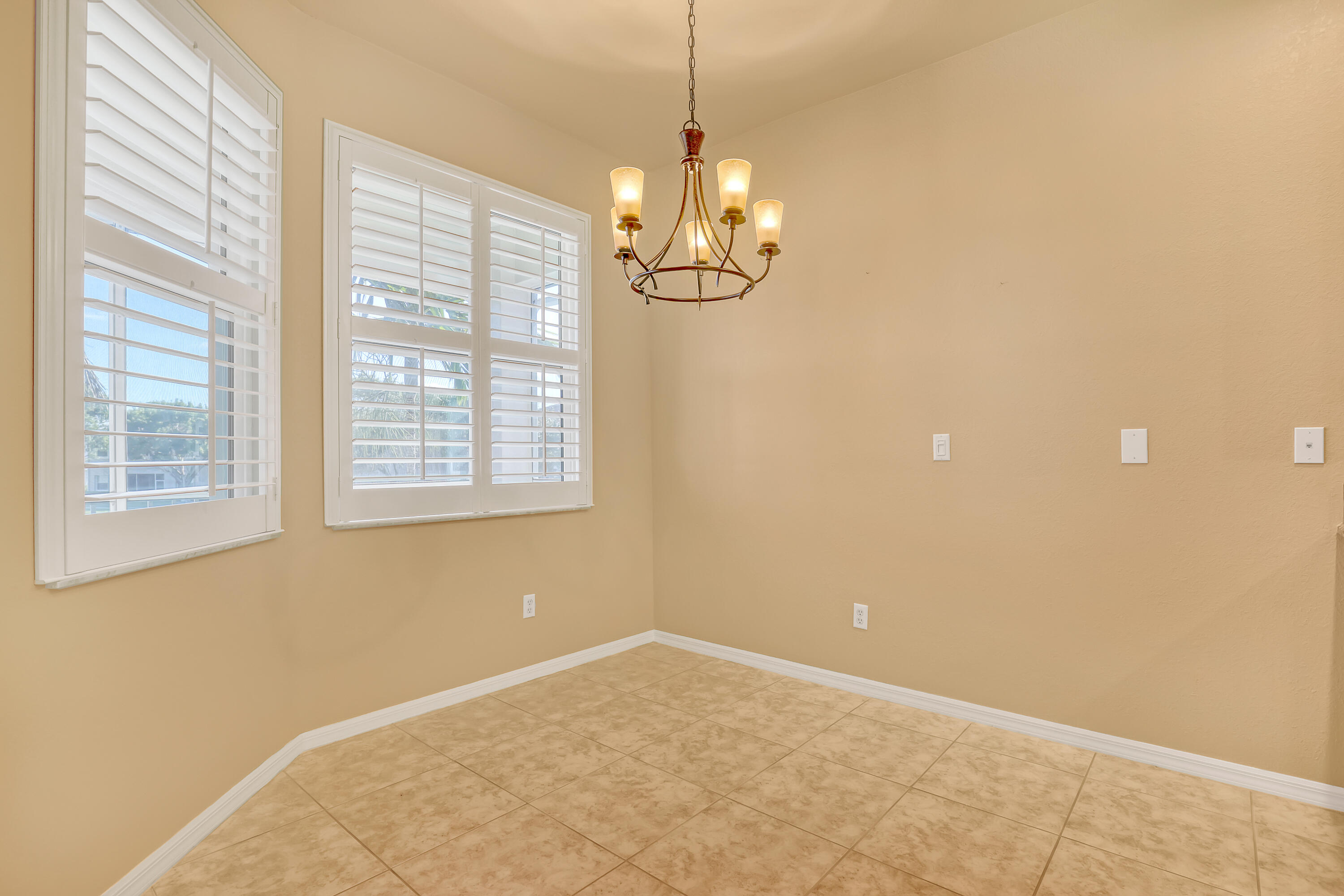 2136 Wingate Bend Wellington, FL 33414 - Photo 8 of 44 a view of an empty room with a window