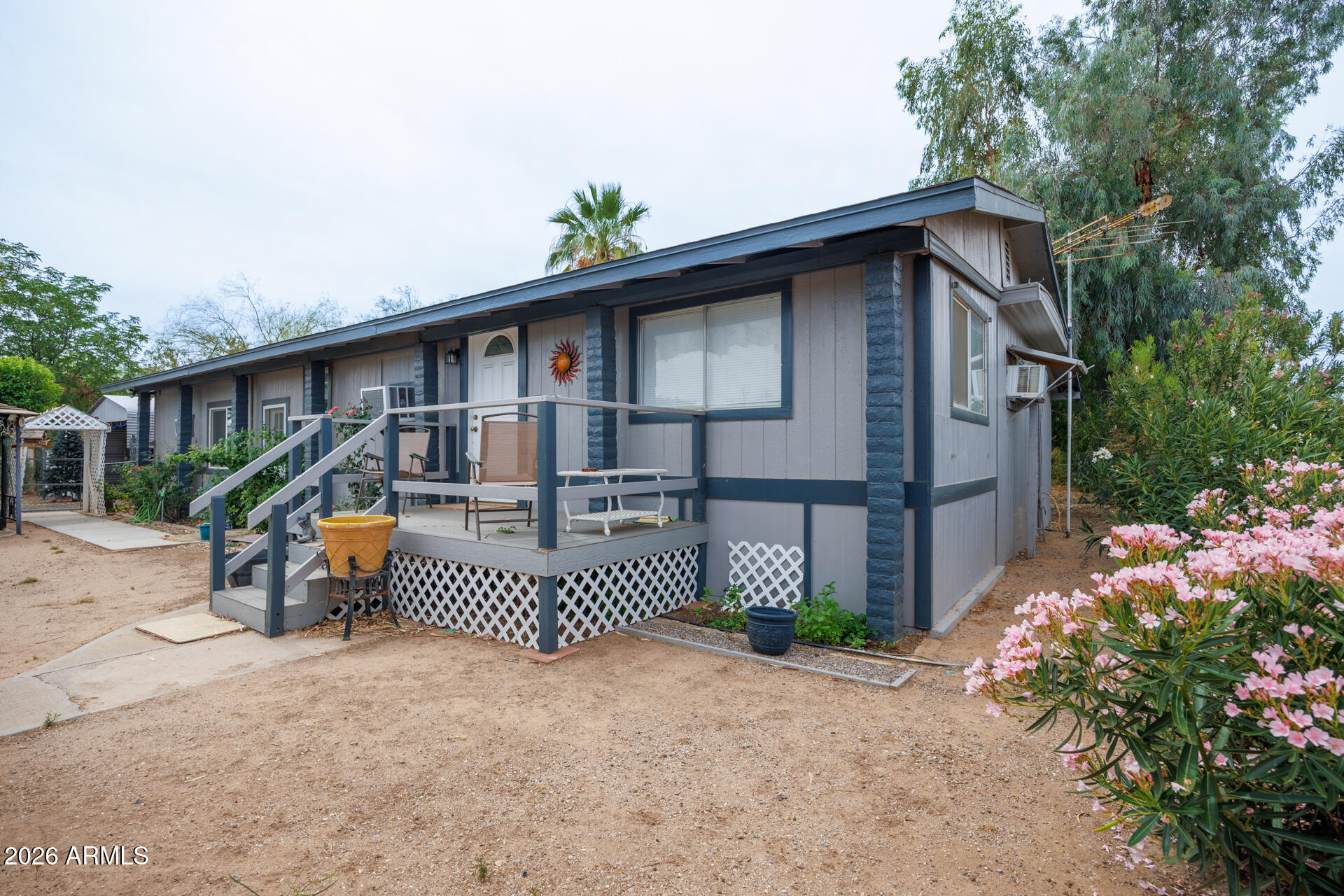 6185 East Monitor Street Picacho, AZ 85141 - Photo 1 of 55 a front view of a house with a garage