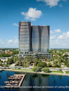 a view of a lake with a large building