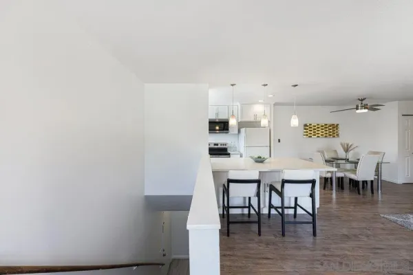 a view of a dining room with furniture