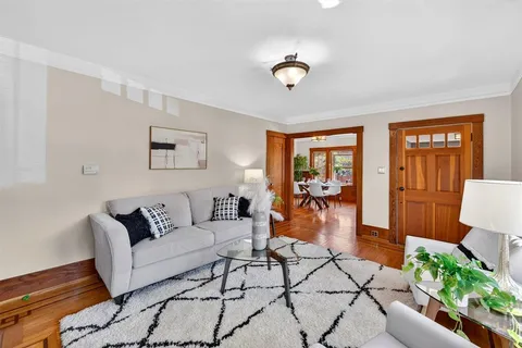 a kitchen with a stove a sink and a refrigerator
