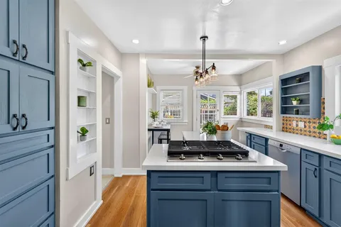 a view of a hallway with white walls