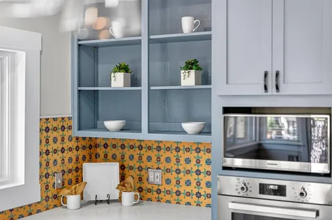 a backyard of a house with seating space