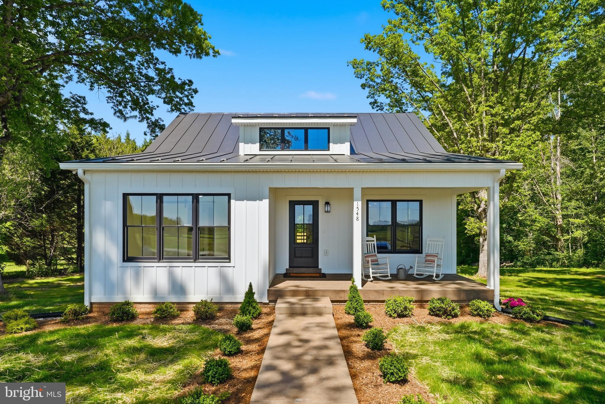 1548 James City Road Reva, VA 22735 - Photo 1 of 48 a front view of a house with a yard
