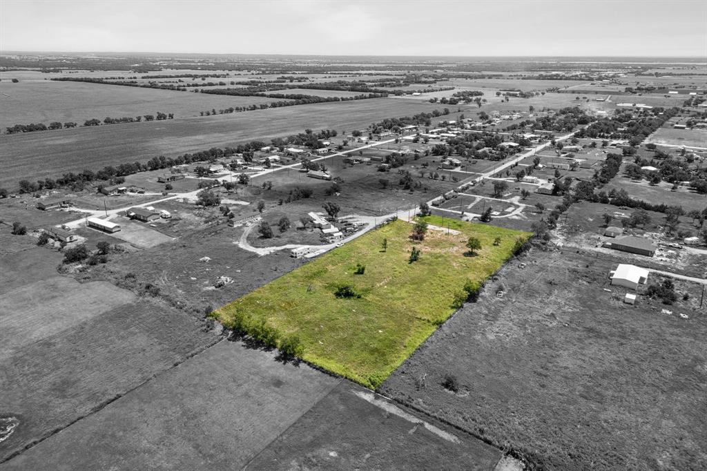 402 Sunflower Drive Valley View, TX 76272 - Photo 2 of 16 an aerial view of a large pool and an ocean view