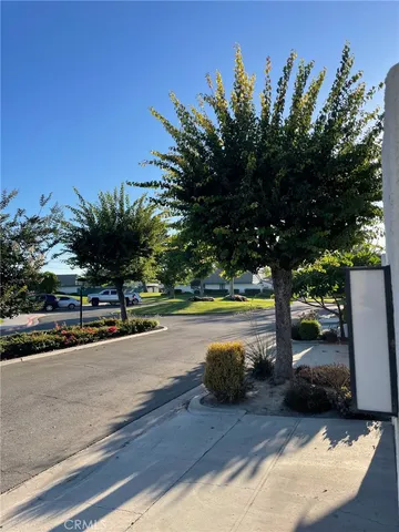 a view of swimming pool from a yard