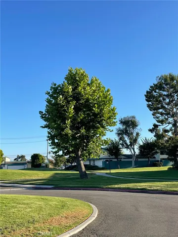 a view of a golf course with a lake