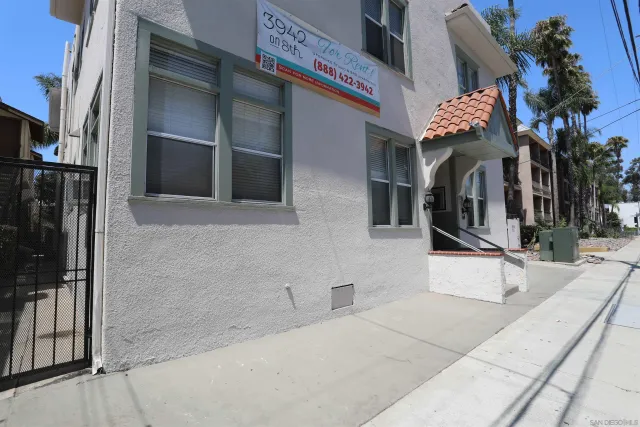 a front view of a house with stairs