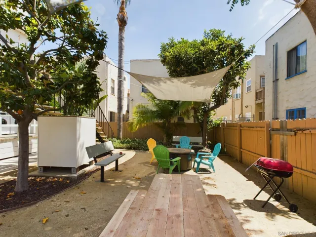 a view of storage and utility room with washer and dryer