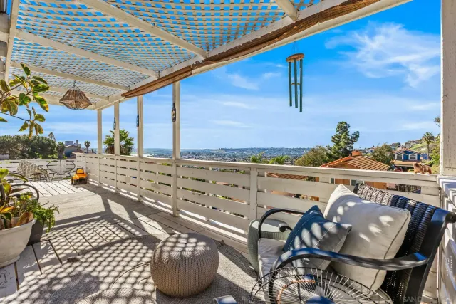 a view of a chairs and table in the terrace