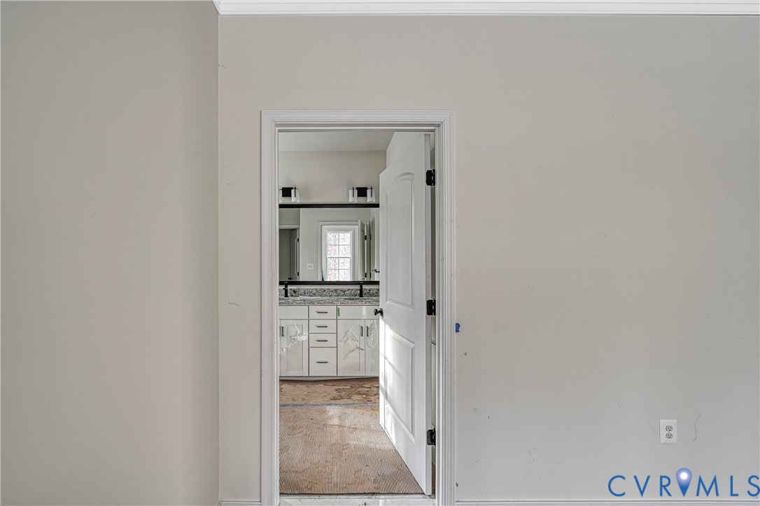 925 Moody Town Road Bumpass, VA 23024 - Photo 22 of 47 a view of a bathroom from the hallway